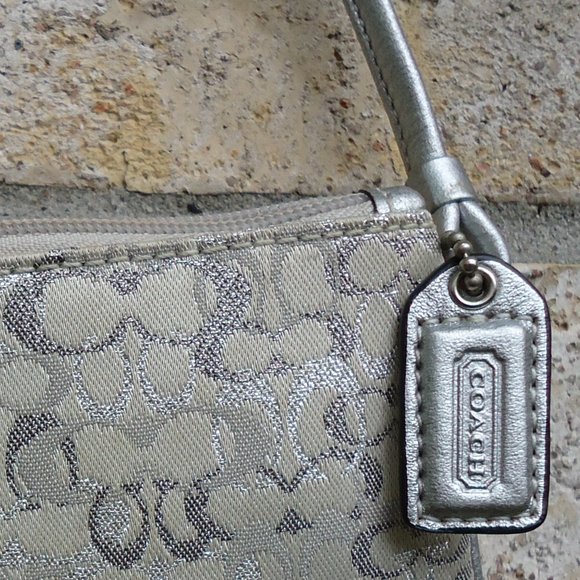 Coach wristlet with classic signature print canvas. - Picture 14 of 16